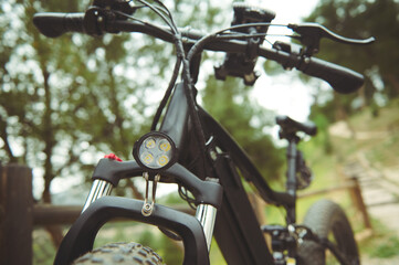 Cropped view of a modern ecologically friendly mode of transport - electric bike bicycle, motor...