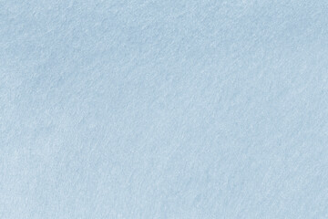 Light blue felt abstract background. Surface of blue color fabric texture.