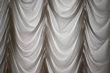 the undulating texture of the curtains