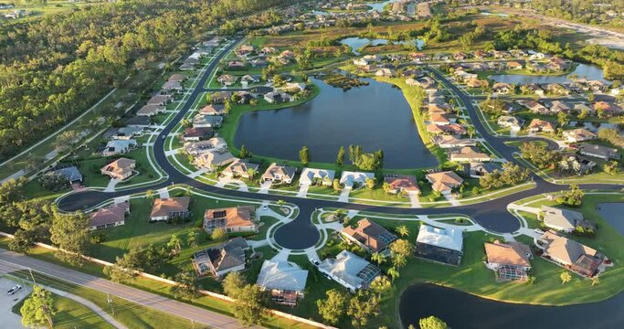 Wealthy neighborhood with expensive waterfront houses in southern Florida. Development of US premium housing market