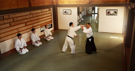 Japanese men, martial arts class or training in fight, modern or aikido to learn self defence....