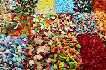 Gummy candies background in candy shop