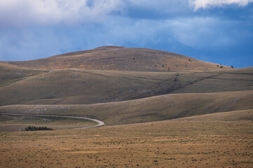 mountain landscape inside the National Park of Gran Sasso and Monti della Laga during an autumnal and cloudy morning, L'Aquila, Italy     