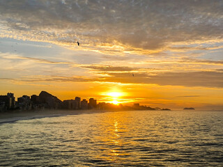 Rio de Janeiro, RJ, Brazil, 04/08/2024 - Sunrise viewed from Leblon Beach viewpoint, South Zone of Rio de Janeiro