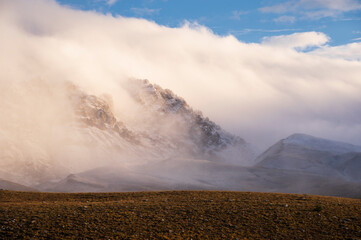 mountain landscape inside the National Park of Gran Sasso and Monti della Laga during an autumnal and cloudy morning, L'Aquila, Italy     