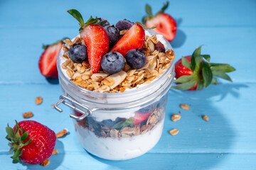 Summer berries granola breakfast layered dessert