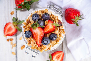 Summer berries granola breakfast layered dessert