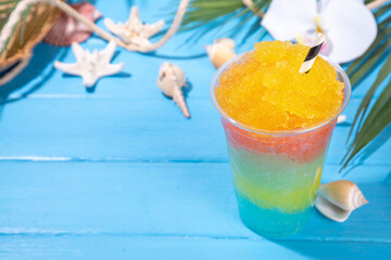 Colorful slushie drink, multicolored frozen juice cocktail