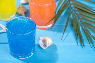 Colorful slushie drink, multicolored frozen juice cocktail