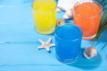 Colorful slushie drink, multicolored frozen juice cocktail