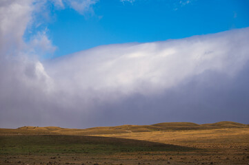 mountain landscape inside the National Park of Gran Sasso and Monti della Laga during an autumnal and cloudy morning, L'Aquila, Italy     