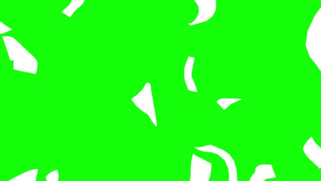 White papers falling down on green background. Green Screen for compositing and presentation.