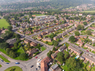 Aerial footage of the British UK town of Chapeltown just outside the Leeds City Centre area in West Yorkshire on a bright sunny day