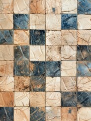A patchwork of worn, cracked tiles in shades of blue and beige, forming an abstract puzzle-like composition with a distinct vintage and weathered character.