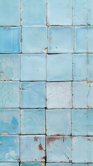 A captivating mural composed of cracked, aged aqua tiles, their imperfections and irregular patterns forming a unique and visually compelling abstract composition.