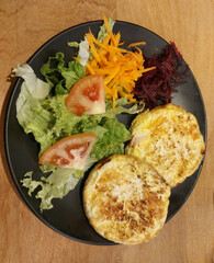 fried egg with vegetables