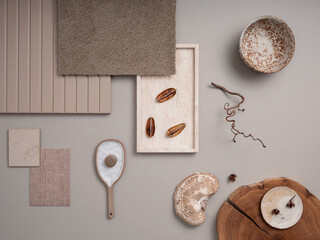 Elegant flat lay composition with textile and paint samples, panels and cement tiles. Stylish...