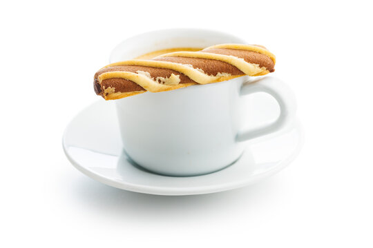 Classic Striped Cookies and coffee cup isolated on white background.