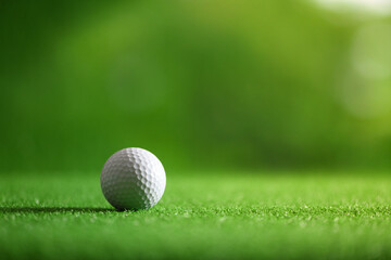 Close-up golf ball on fairway golf course.
