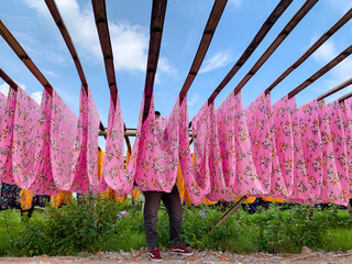 Drying colored cloth after dyeing. fabric making in Klaten.