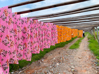 Drying colored cloth after dyeing. fabric making in Klaten.