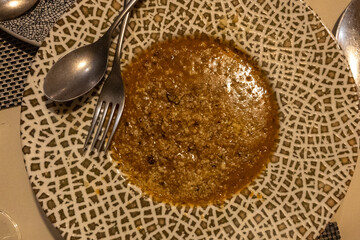 mellow rice with shavings of iberico on plate