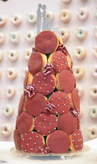 Colorful decorated donuts on a wedding party.