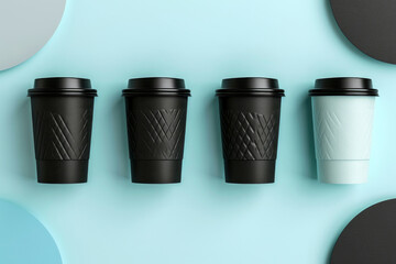 Four black and blue coffee cups with lids on a stylish blue and black background