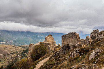 view of the Castle of Rocca Calascio inside the Parco Nazionale del Gran Sasso e Monti della Laga,...