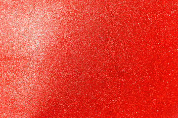 Abstract blurred red glitter texture background, shiny red glitter background