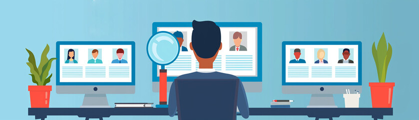 A recruiter analyzing candidate profiles on a computer screen with a magnifying glass icon, representing the meticulous selection process - obrazy, fototapety, plakaty