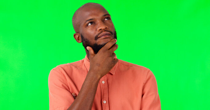 Black man, thinking and mindset on green screen, decision and brainstorming, mockup space on studio background. Ideas, thoughtful and contemplating choice, male person with question and inspiration