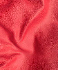 Looking down onto a piece of wrinkled red leather close up 3d render