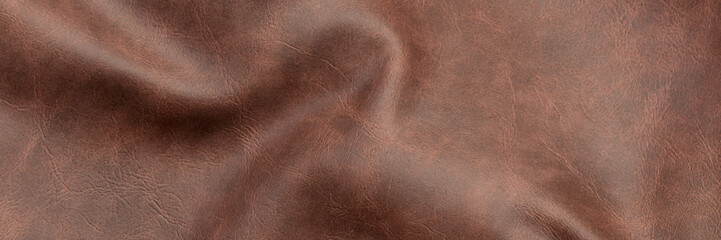Looking down onto a piece of wrinkled brown leather close up 3d render