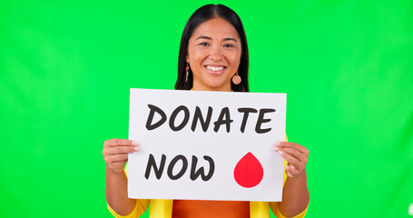 Asian woman, billboard and blood donation on green screen for advertising against a studio...