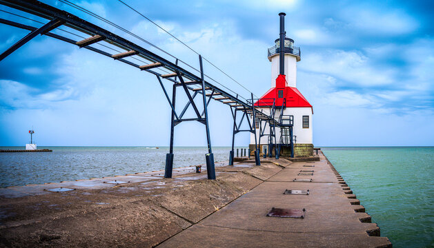 St Joseph North Pier Inner Lighthouse, iconic navigational architecture on a breakwater with an elevated catwalk at Tiscornia Park, in St. Joseph, Benton Harbor area, Michigan, USA