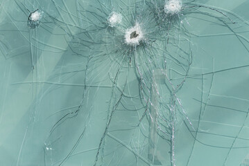 Close-up of a broken window. Vandalism, damage, destruction, accident