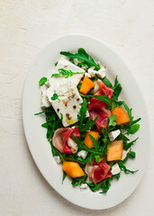 salad, melon with prosciutto, arugula, and cheese, summer salad, vegetarian, homemade, no people,