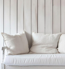 Template of sofa on a white wooden wall, country home living room closeup. Interior mockup with clean walls for pictures, posters, paintings, sculptures, and other wall art.