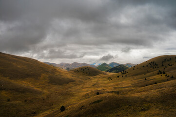 landscape inside Campo Imperatore during an autumnal cloudy day, Parco nazionale Gran Sasso, L'Aquila, Italy