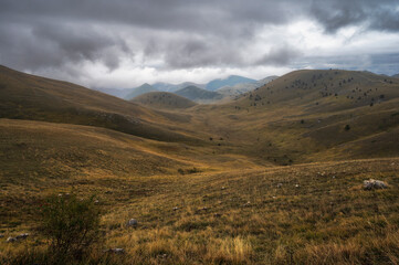 landscape inside Campo Imperatore during an autumnal cloudy day, Parco nazionale Gran Sasso, L'Aquila, Italy