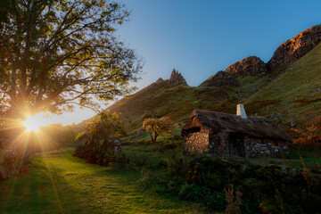 Traditional old irish house on mountain view of the sky on sunrise hidden village of galboly...