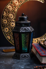 Closeup image of Lantern lamp with Quran, Eid Background