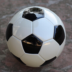 Glossy Soccer Ball Isolated on Outdoor Background. Clipart for sports projects.