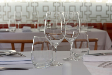 Transparent glasses in a stylish restaurant