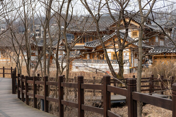 Wooden path in Eunpyeong Hanok Village, the largest neo-hanok residential complex in the capital area which surrounded by hills and mountains in Seoul, South Korea