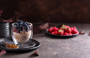 breakfast in a glass granola yogurt and fresh berries