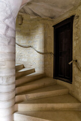Staircase in French medieval castle - 779849125