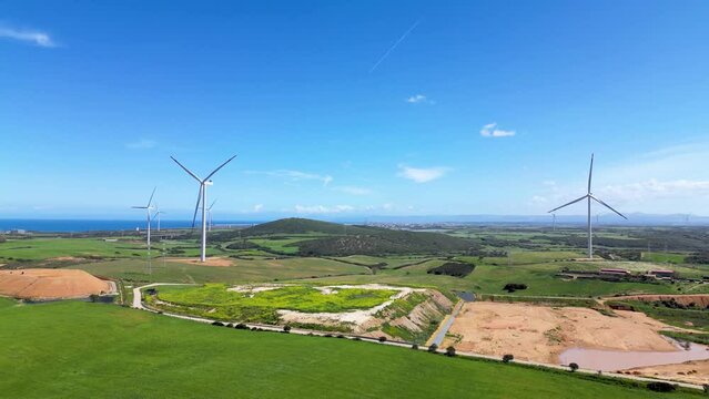 Wind farm on the picturesque hilly terrain of Sardinia.