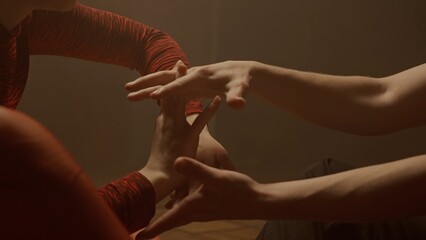 Professional dancers performing dance show. Young man and woman contemporary dancers perform modern...